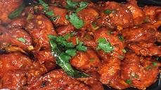 Fried chicken cooked in a combination of Indian spices.