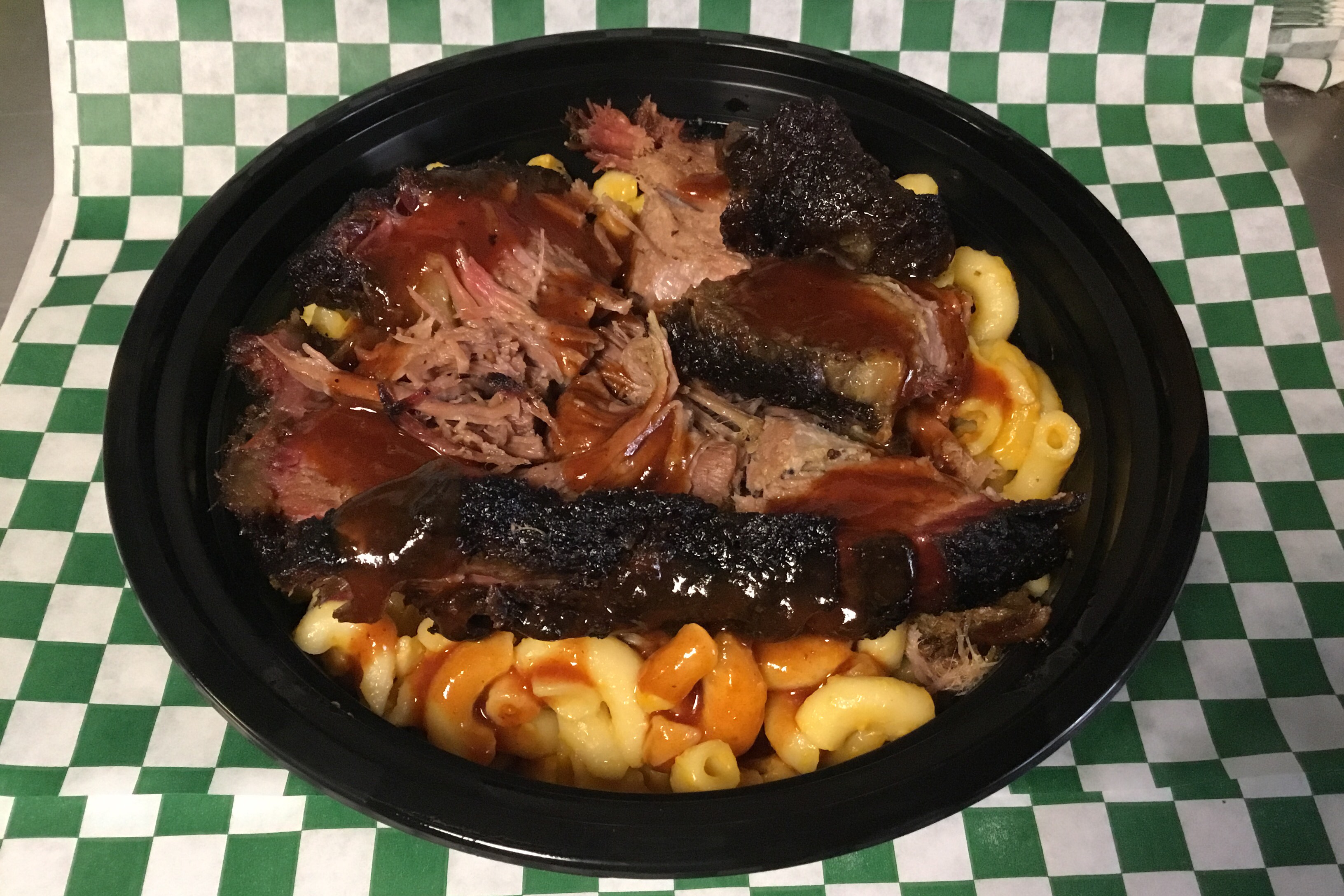 Choice of slow-smoked BBQ meat on top of Mac & Cheese, with BBQ sauce.