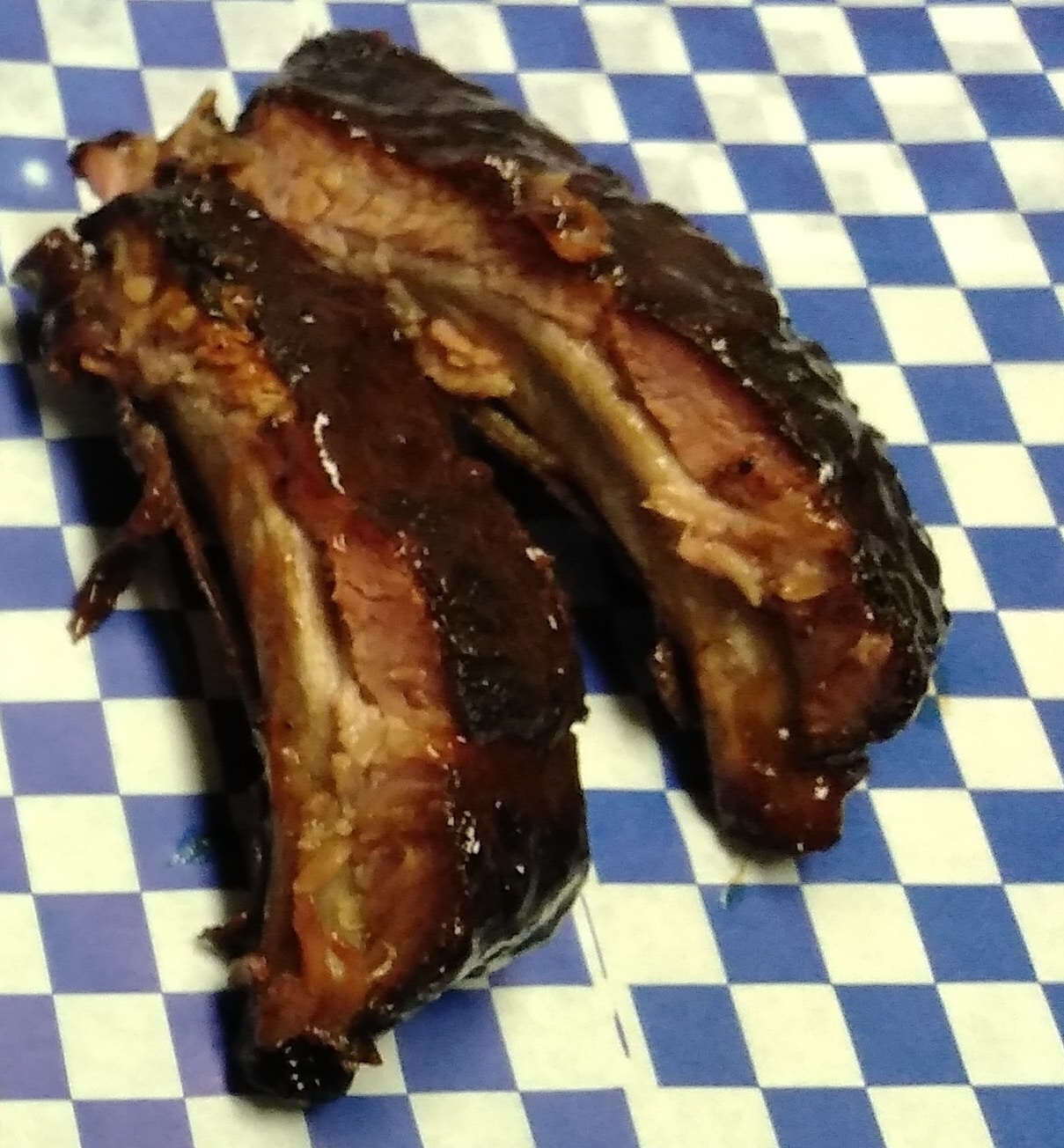 Two smoked Raining BBQ signature ribs served with fries or one side order of choice.