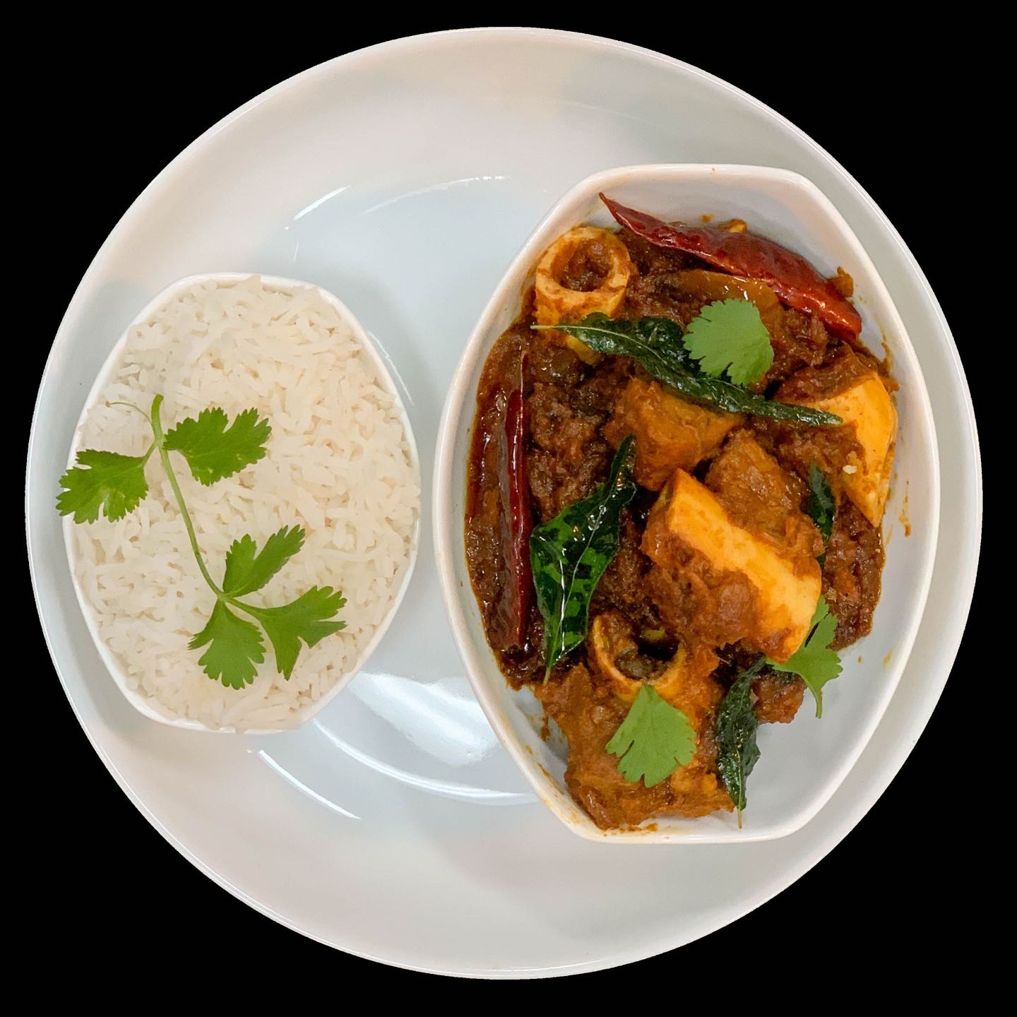 Bone in goat home style curry.