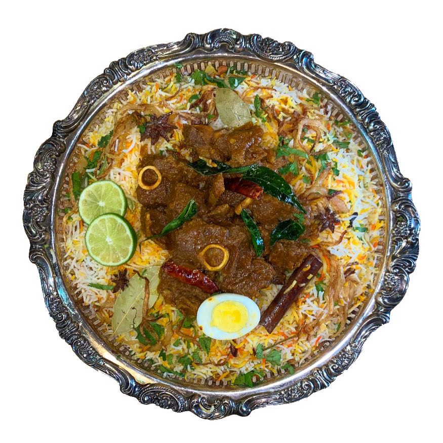 Marinated Halal goat meat pan-fried in South Indian style, then layered in Biryani.
