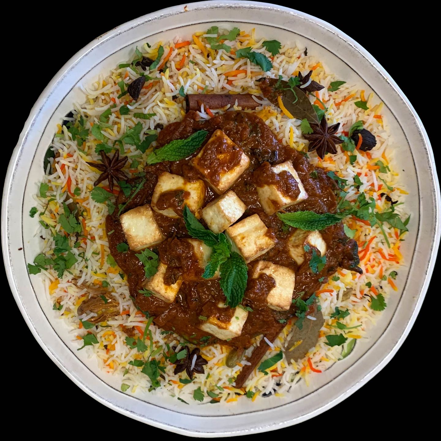 Golden fried paneer cubes tossed in house-made onion and herb sauce.