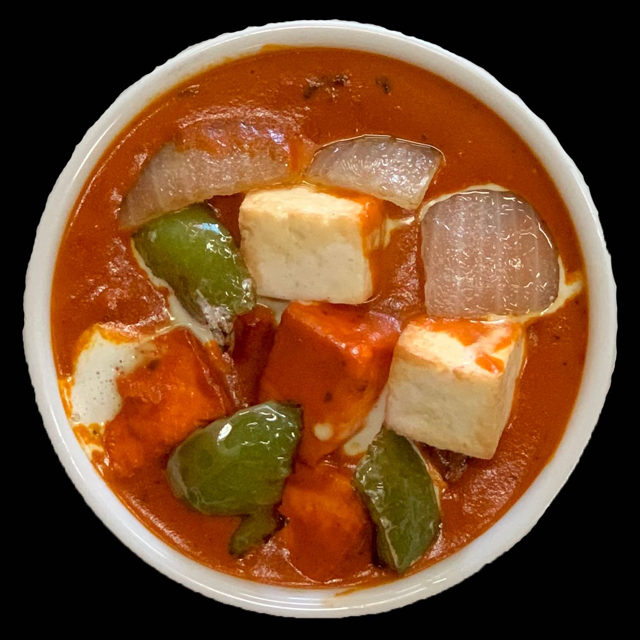 Golden fried paneer cubes cooked in rich and creamy sauce.