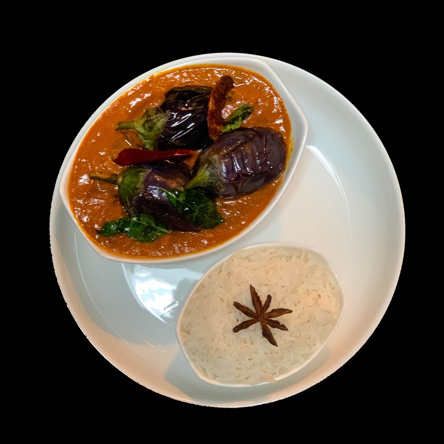 Indian eggplant tossed in gravy made of cashews, peanuts, and a blend of spices.