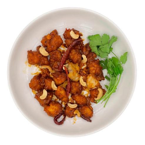 Chicken crisped fried with house made yogurt sauce and cashew nuts.