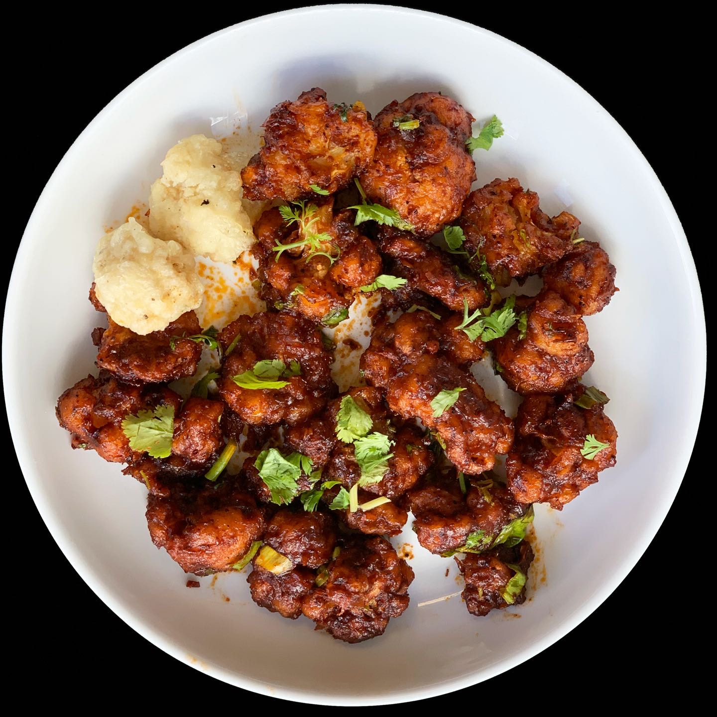  Baby corn fried in Indo-Chinese fusion sauce.