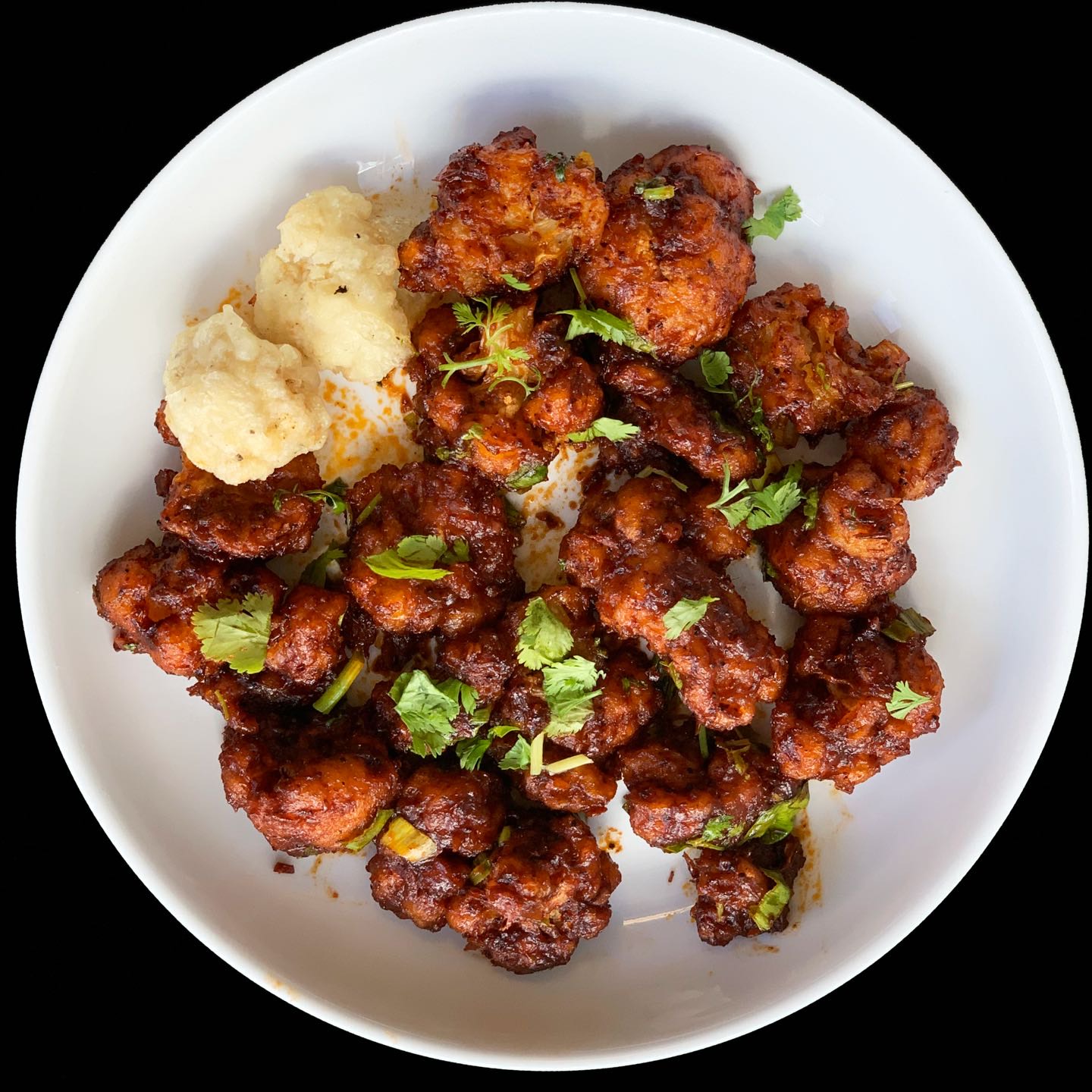  Paneer (cubes of mild Indian cheese) fried in Indo-Chinese fusion sauce.