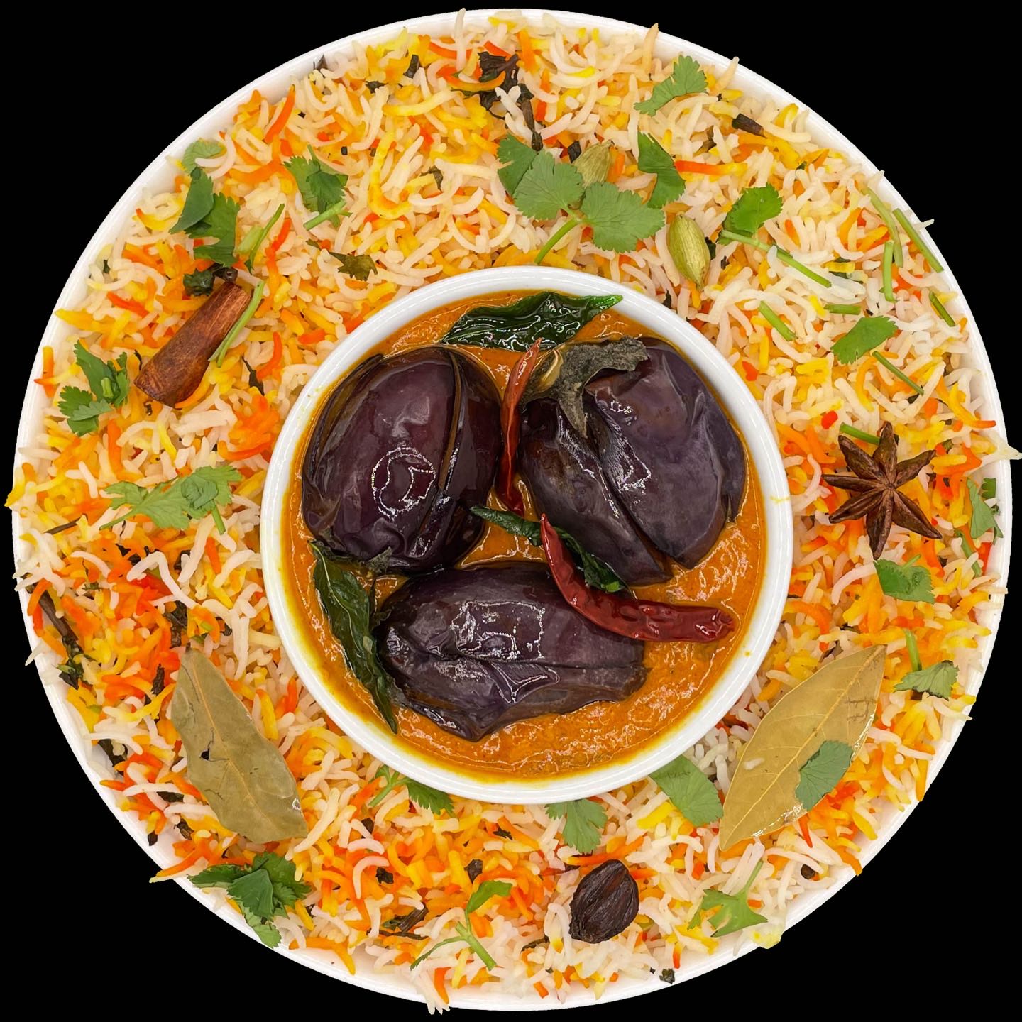Indian eggplant cooked in layers of rice filled with herbs and spices. It’s a delicious choice for vegetarians.