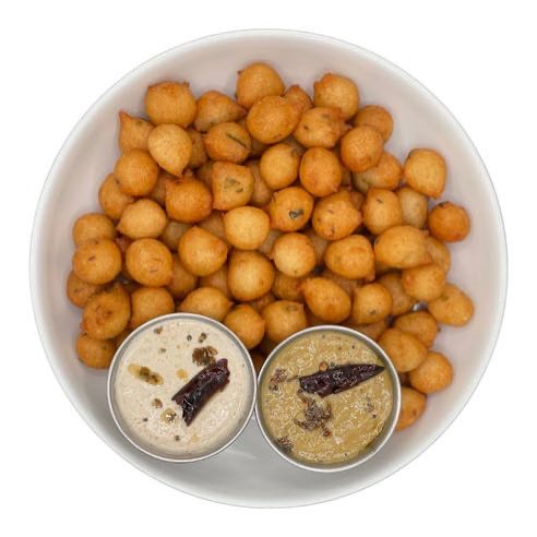 Popular deep fried snack made with rice flour, lentils and special spice mix. Served with fresh coconut chutney and ginger chutney.