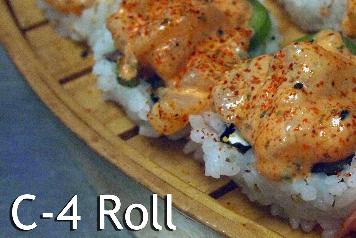 Tempura shrimp, cucumber, cream cheese, salmon and krab salad topped with diced spicy scallop and fresh jalapeno