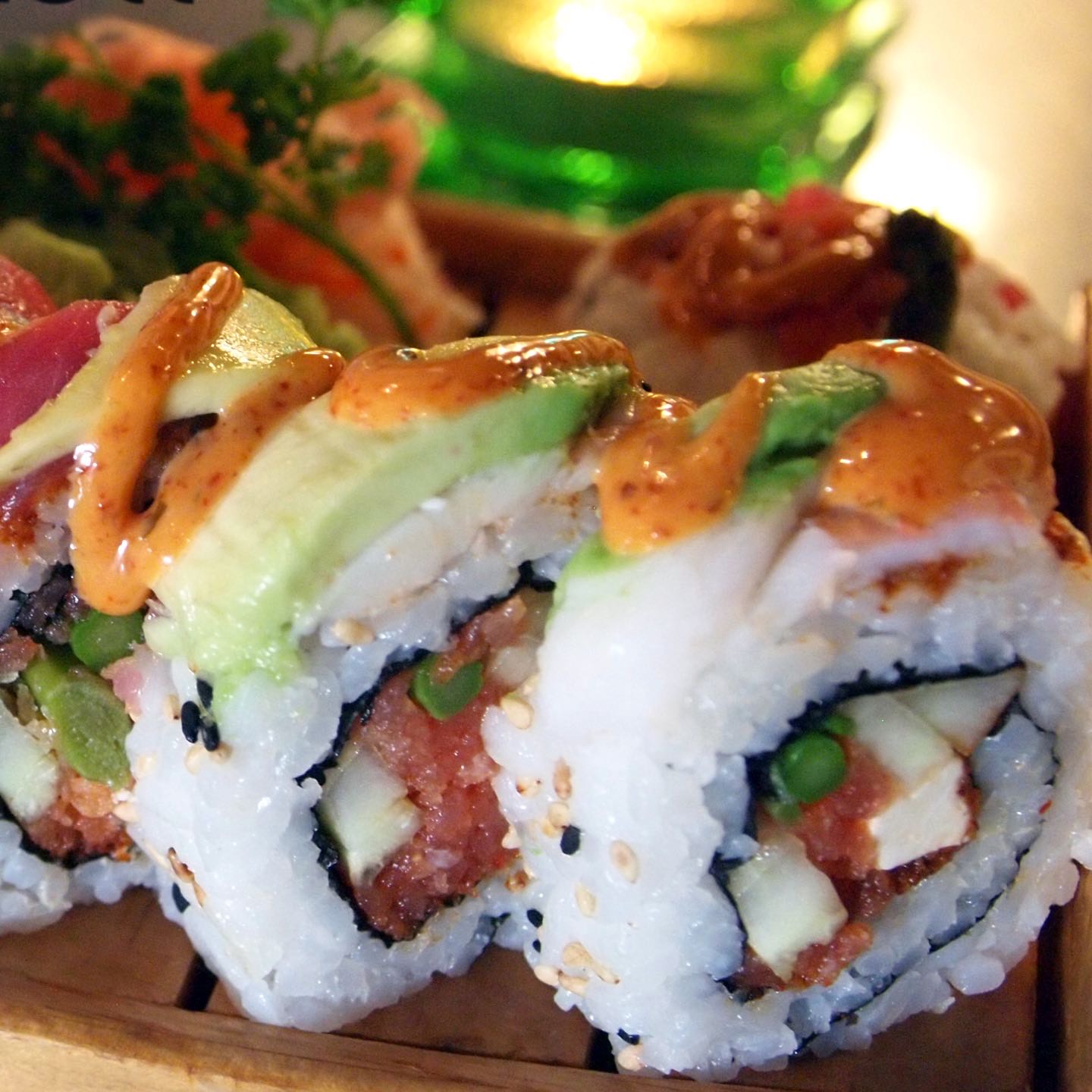 Spicy tuna, cucumber, asparagus, cream cheese and crunch topped with spicy tuna, tuna, shrimp, avocado and hot sauce