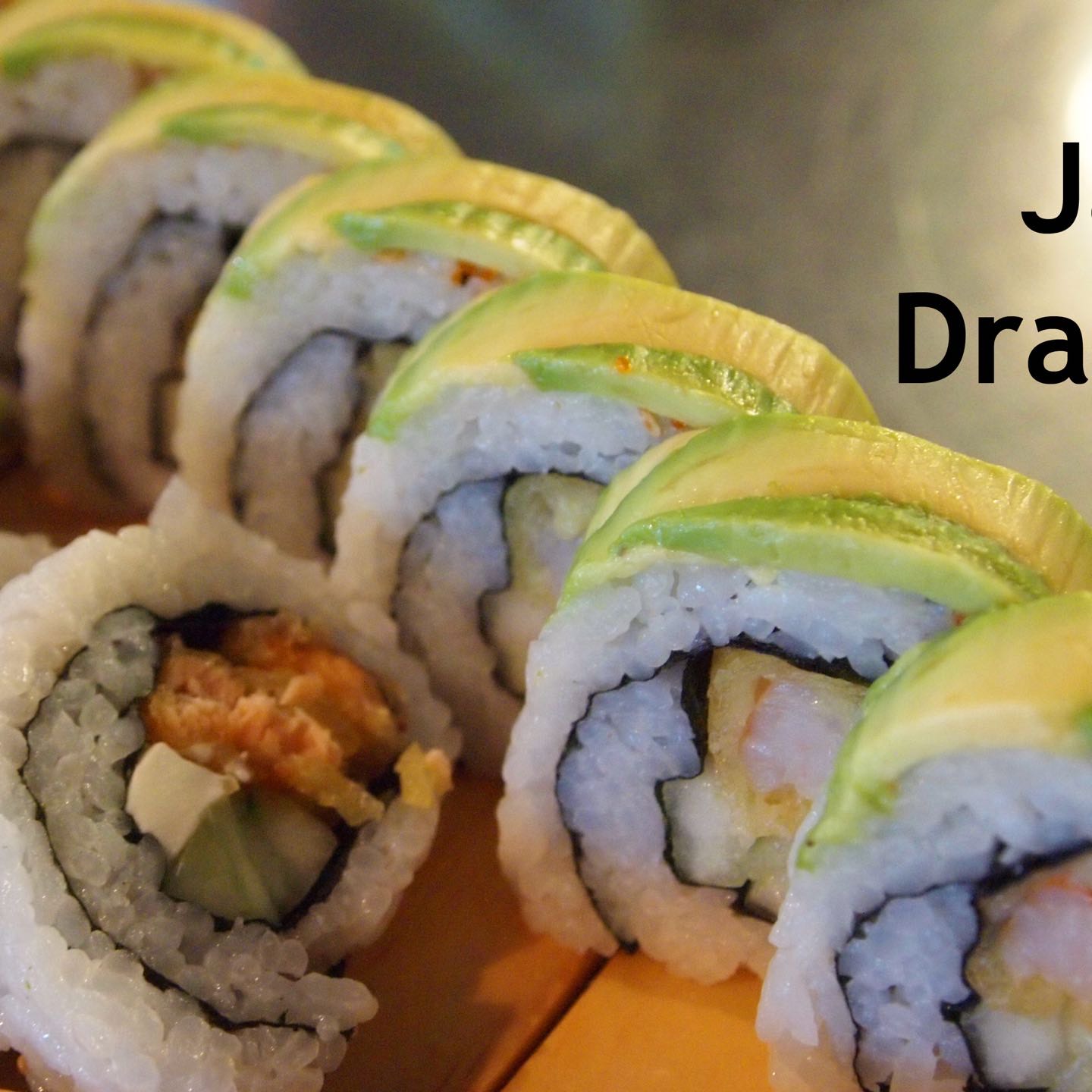 Tempura shrimp, asparagus, cucumber and masago on the inside, avocado and a sweet sauce finish on top