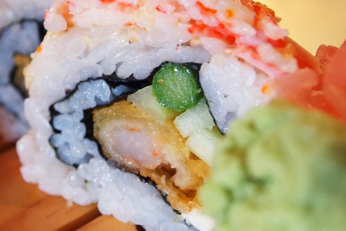 Tempura shrimp, asparagus, avocado, cucumber and cream cheese, layered with krab salad, masago, tempura crunch, and our sweet sauce