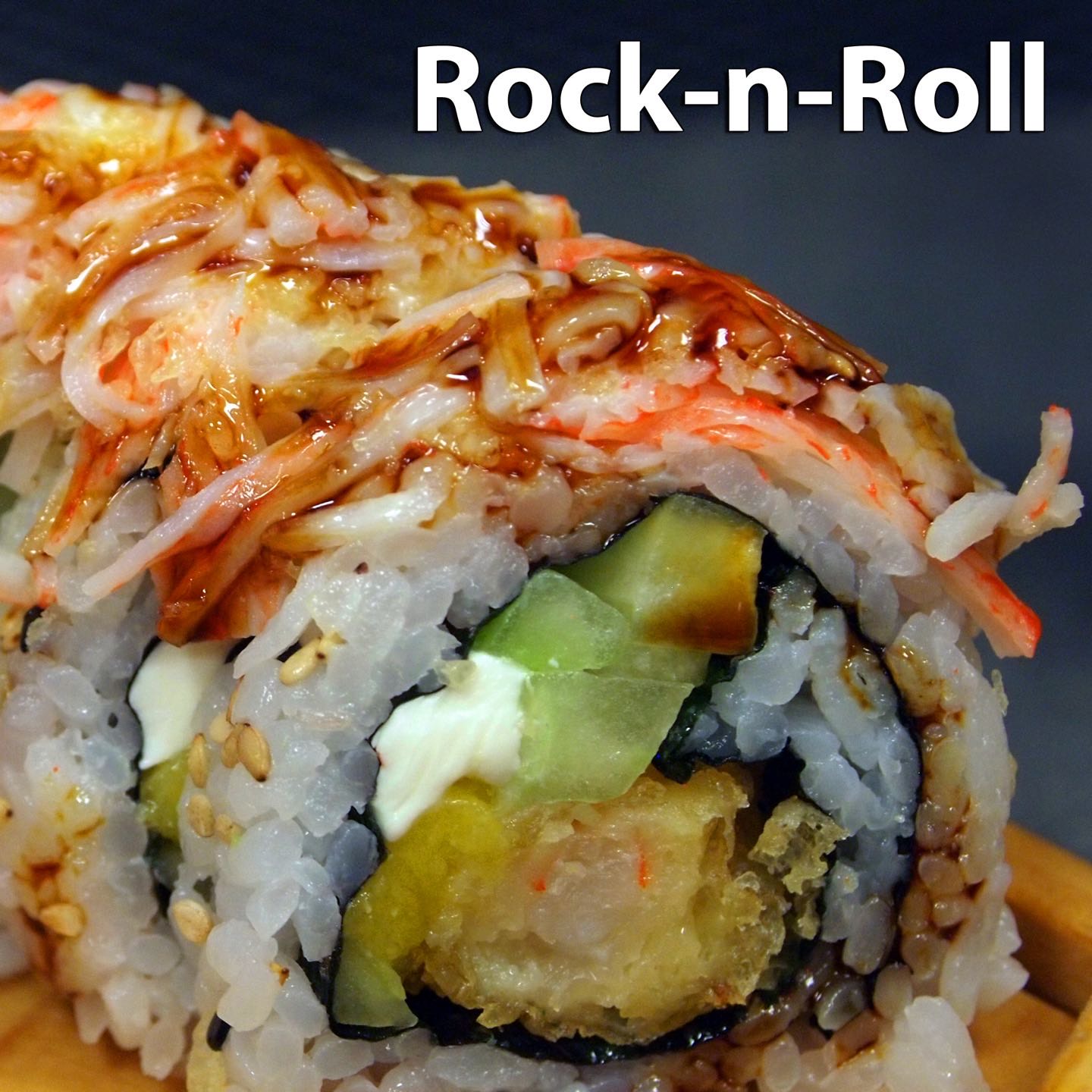 Tempura shrimp, cucumber, mango and cream cheese base with a krab salad, masago, tempura crunch and sweet sauce topping