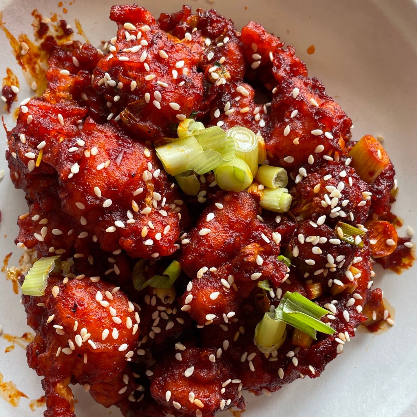 Deep fried batter coated cauliflower tossed with Manchurian sauce.