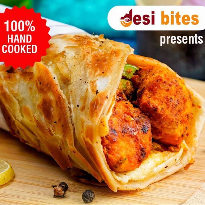 Marinated chicken roasted in tandoor, wrapped in a home style laccha paratha, with a unique Desi Bites sauce.