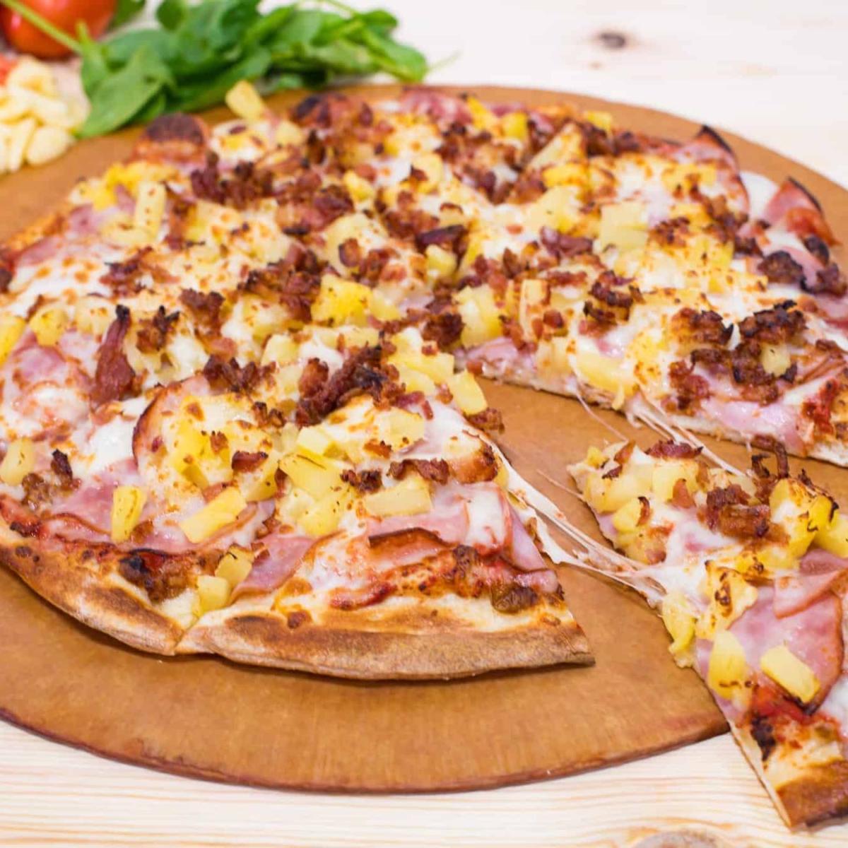 Extra Canadian Bacon, Extra Pineapple, Extra Cheese and Breakfast Bacon with our Red Sauce. - Odd Moe's Pizza - Tanasbourne restaurant in Hillsboro, OR