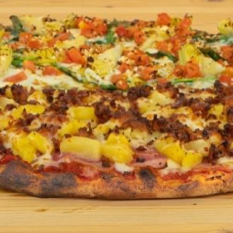 We begin with freshly shredded 100% part-skim mozzarella (vegan cheese also available).