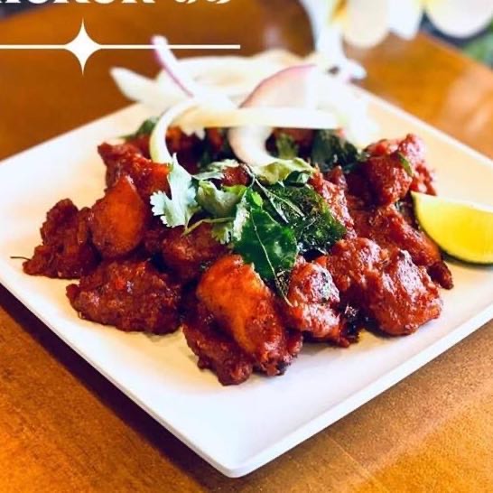 Tender chunks of chicken marinated in a fiery blend of spices, deep-fried to perfection, delivering a tantalizing burst of flavor with every crispy bite.
