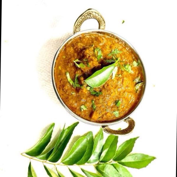 Fresh vegetables cooked with aromatic spices and herbs in a rich tomato-based gravy. Served with steamed rice.