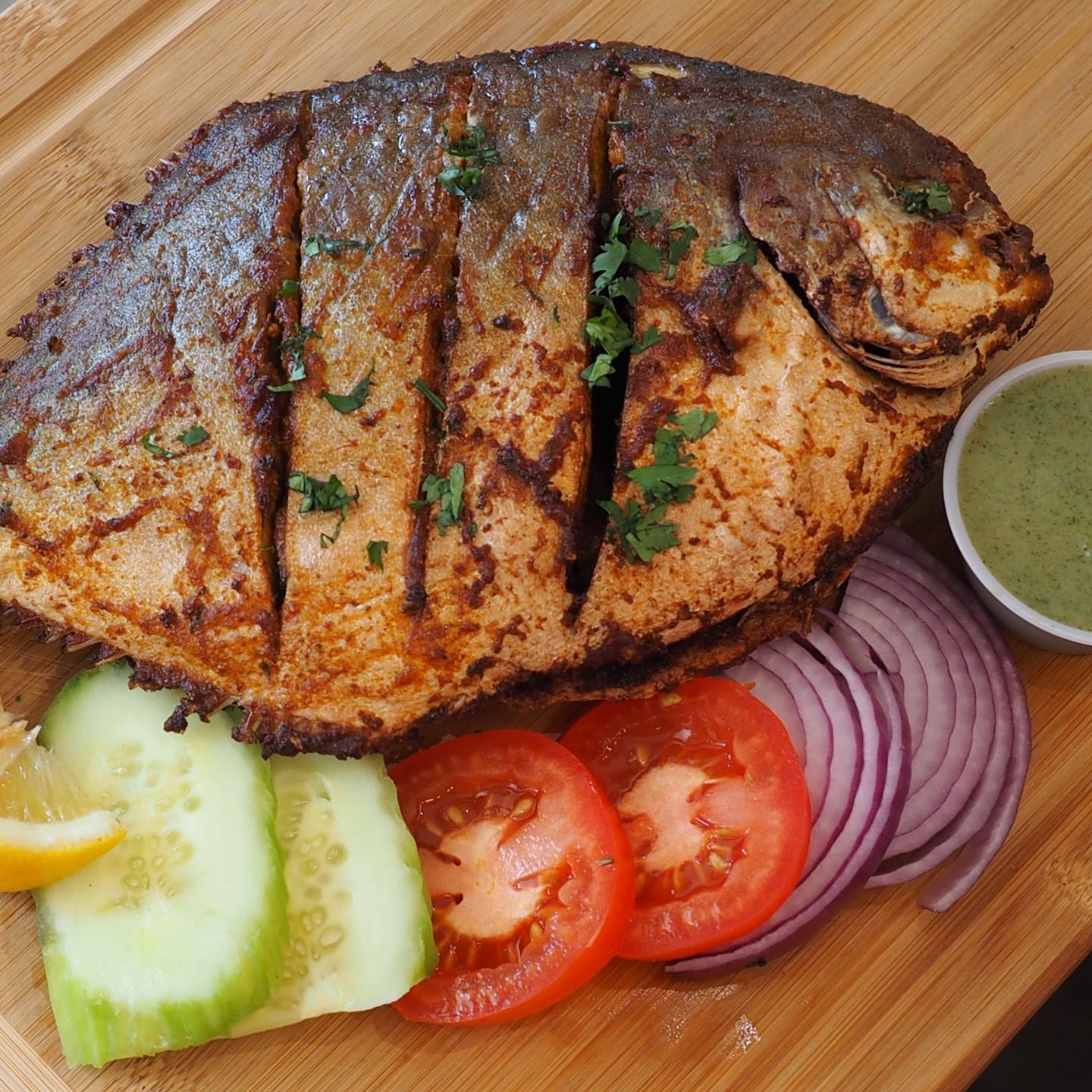 Whole bone-in fish fry, mint sauce.