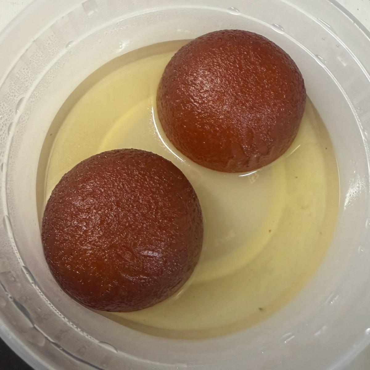 50. Gulab Jamun (2 pcs) - Desserts menu item