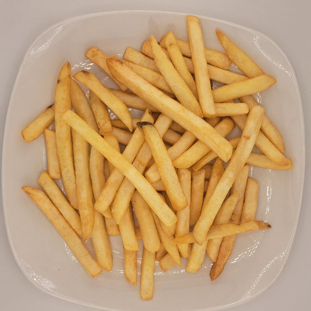 Golden brown fries with salt. - East Coast Eddie's Authentic Philly Cheese Steaks - Beaverton restaurant in Beaverton, OR