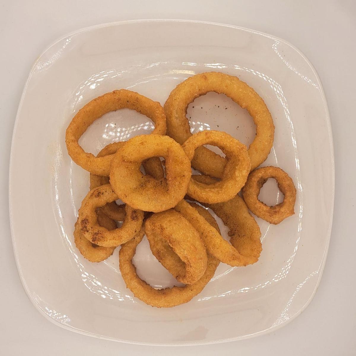 Golden Thick cut Onion Rings with a light seasoned. - East Coast Eddie's Authentic Philly Cheese Steaks - Beaverton restaurant in Beaverton, OR