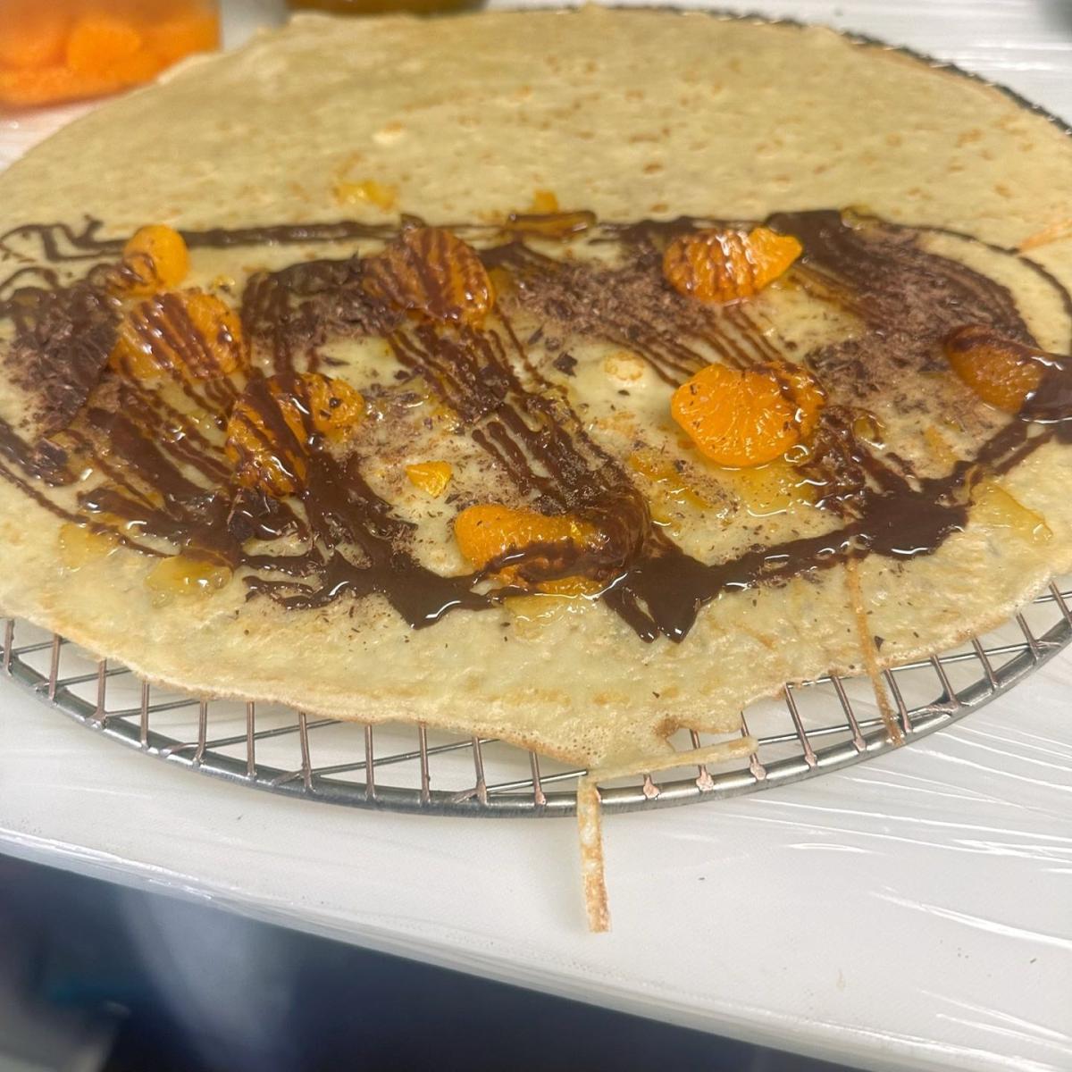 Yuzu jam, sliced oranges, chocolate shavings & chocolate drizzle. - Oh My Crepe restaurant in Hillsboro, OR