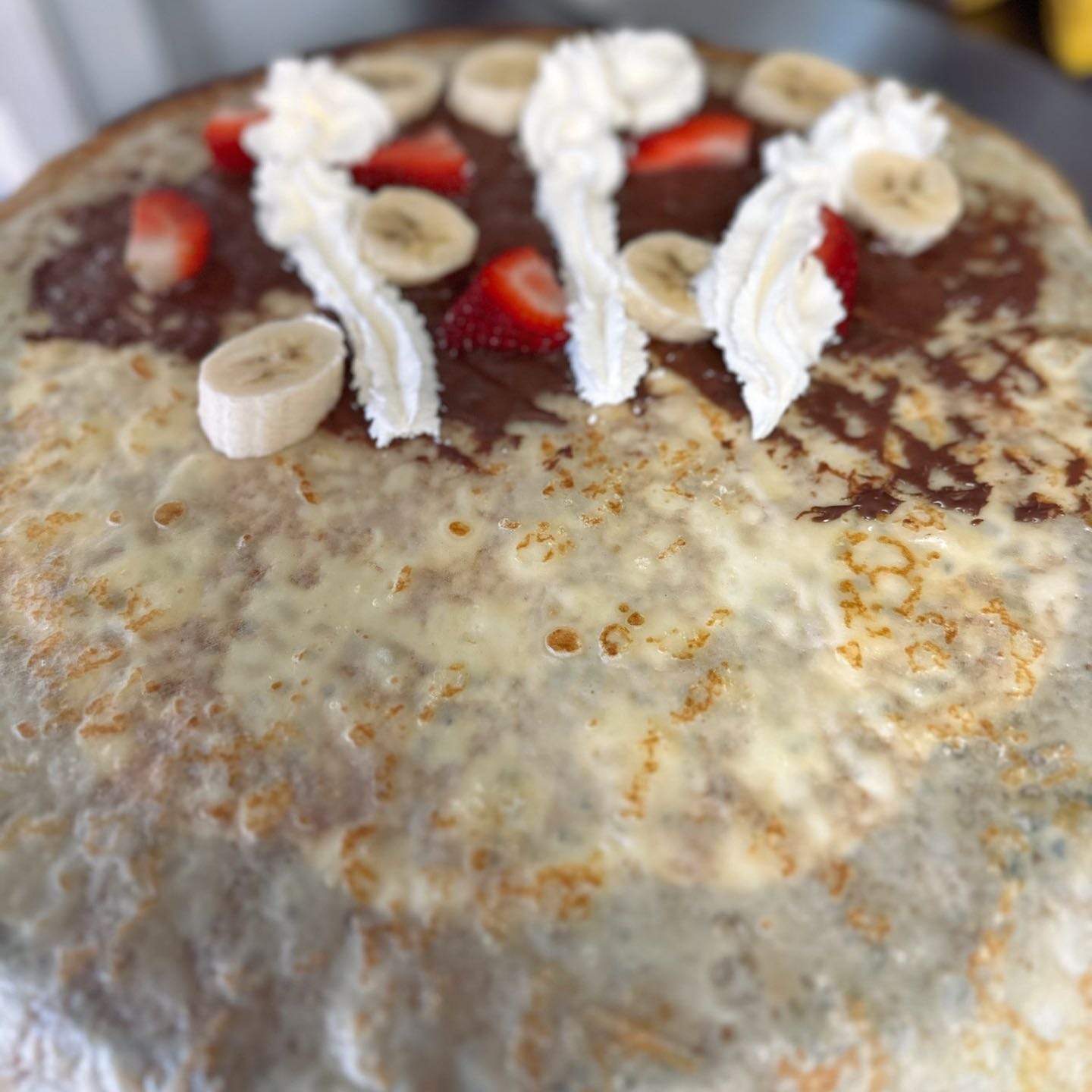 Nutella, strawberries, banana & homemade whipped cream. 