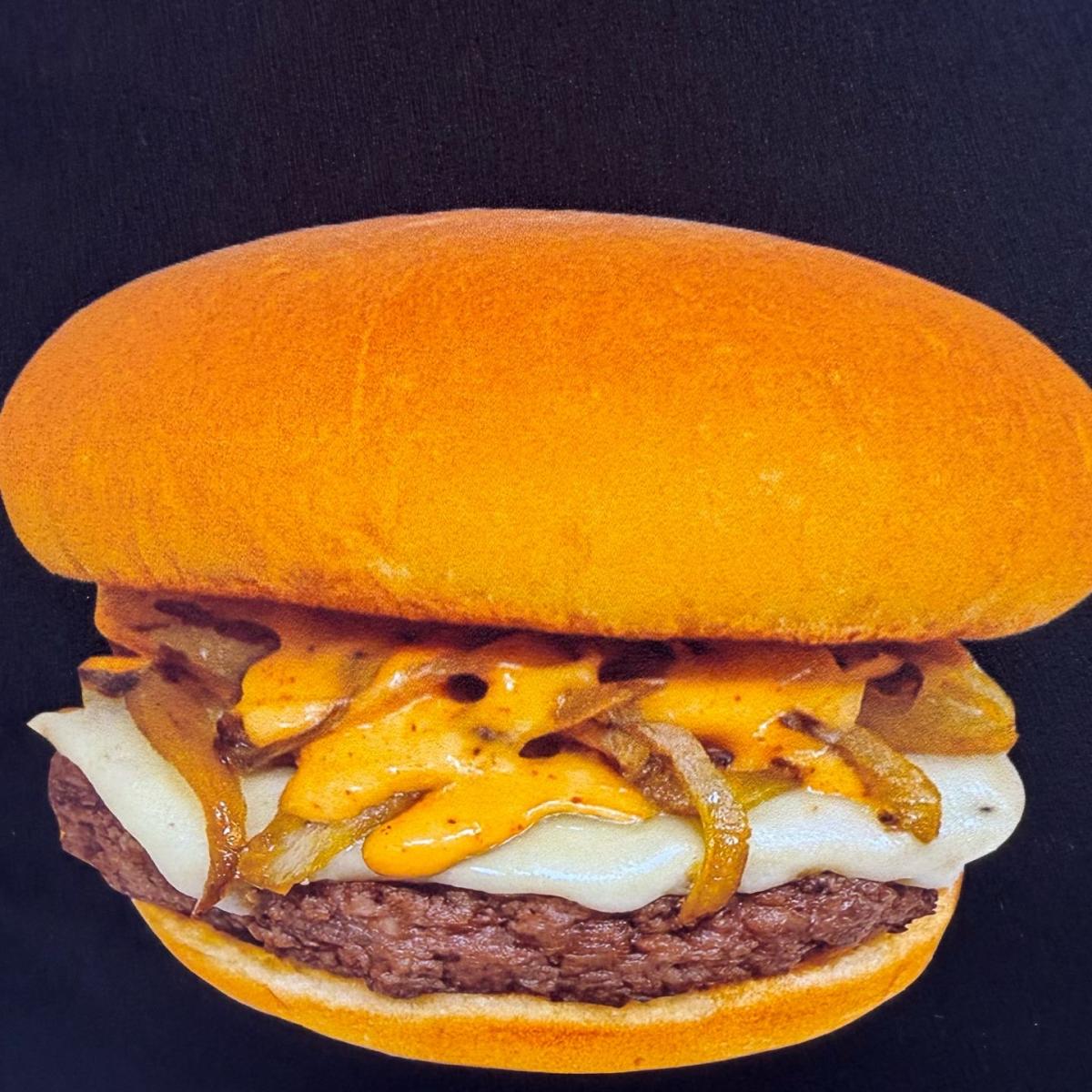 Comes with hamburger, house sauce, grilled onions and cheese. Served with fries. - Singh Is King Smashburger restaurant in Beaverton, OR