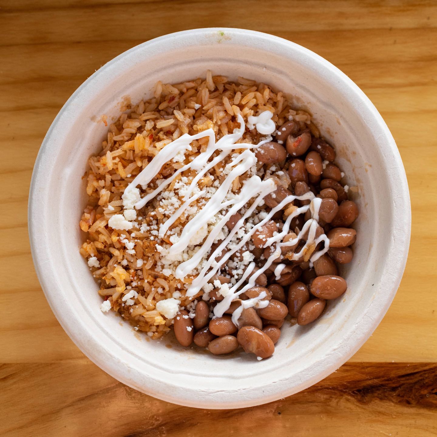 Rice and beans with Mexican cheese.