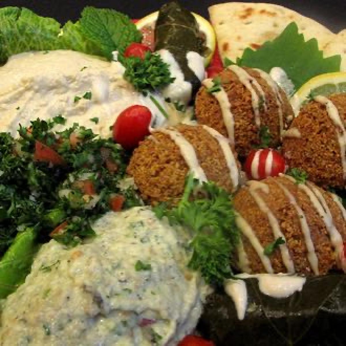 Homemade falafel, hummus, dolmades, Greek salad and baba ghanouj with Greek pita.  Add chicken or lamb for $6. - Aybla Grill restaurant in Beaverton, OR